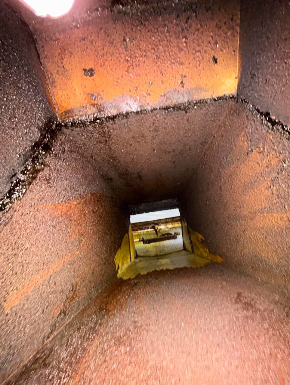 Commercial exhaust chamber before cleaning